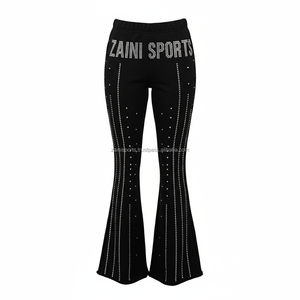 Pantalones de Mujer con Corte Acampanado, Tela de Poliéster Premium de 320 GSM, Color Negro, Logotipo Personalizado, Diseño con Pedrería Termoadhesiva, Corte Elegante - Product Image 1