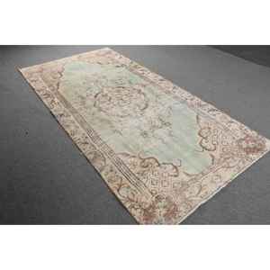 Tapis vintage 4,7 x 9,3 pieds, grand tapis turc, tapis à imprimé animal brun et vert - Product Image 2