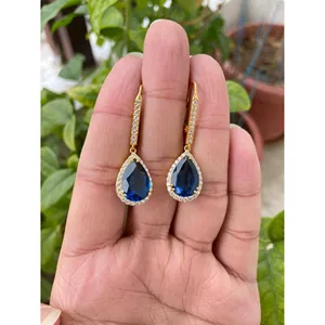 Boucles d'oreilles pendantes en argent 925 avec topaze bleue et plaqué or rose, forme géométrique, pour mariage ou soirée - Product Image 1