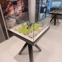 Tables d'exposition de montres modernes avec éclairage LED, vitrines de luxe pour bijoux et montres, fabrication sur mesure par le fabricant source.