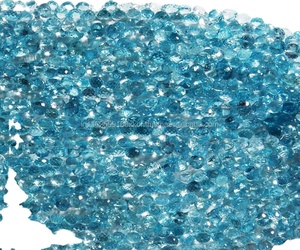 Vente en gros de perles semi-précieuses naturelles en forme de goutte d'oignon topaze bleu ciel qualité supérieure pour la fabrication de bijoux - Product Image 1