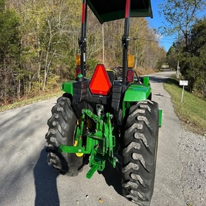 Compre el tractor compacto John Deere 4066M en stock, entrega rápida y calidad superior diseñada para funcionar - Product Image 1