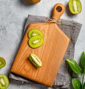 Tabla de cortar de madera reversible de nuevo diseño con dos lados utilizables para cortar y servir rutinas de cocina diarias versátiles - Product Image 1