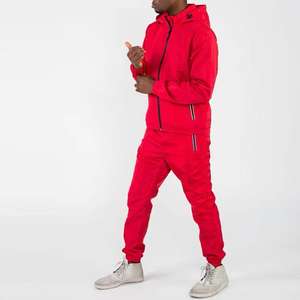 Conjuntos cortavientos de dos piezas transpirables con logotipo personalizado para hombre, pantalones para correr sólidos, chaqueta de invierno, chándal cortavientos - Product Image 1