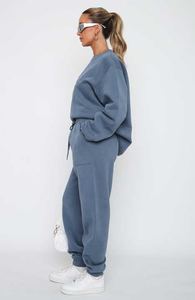 ชุดวอร์มผู้หญิงผ้าคอตตอนโพลีเอสเตอร์ผ้าฟลีซผสมสีล้วนพิมพ์ลายแบบลำลอง - Product Image 5