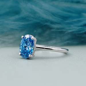 Anillo de compromiso ovalado con halo oculto y diamante azul de fantasía certificado por IGI - Product Image 3