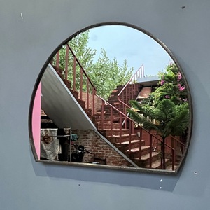 Miroir mural décoratif demi-rond au design unique avec finition noire - Product Image 1
