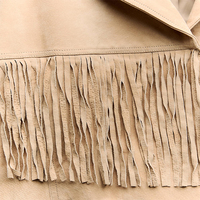 Veste d'hiver respirante pour femme OEM, beige clair, élégante, à manches longues, à franges, unie, confortable, en cuir véritable, style western, tricotée