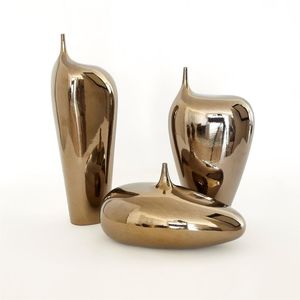 Florero de aluminio cepillado brillante Diseño costero elegante con base ancha para una elegante exhibición de floración estacional hecha de hierro - Product Image 1