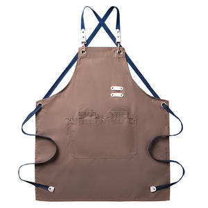 Delantal de Chef de Lona Resistente al Agua y al Aceite con Logotipo Personalizado, Color Marrón, Estilo Cruzado en la Espalda, con Bolsillos para Uso en la Cocina - Product Image 1