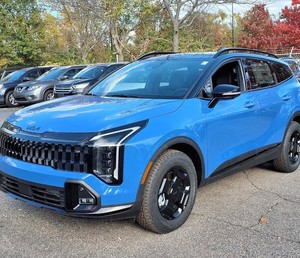 Kia Sportage X-Pro Prestige AWD 2025 Bleu Spécial d'occasion avec toit ouvrant, démarrage à distance, sièges en cuir, jantes en alliage, système de navigation - Product Image 1