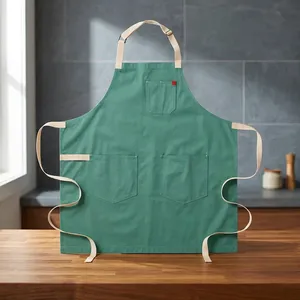 Tablier de travail en toile verte robuste et réutilisable avec 3 poches, taille ajustable, style classique pour les produits de nettoyage et l'usage quotidien - Product Image 1