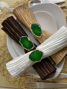 Handcrafted resin napkin rings with glossy finished and intricate carving design for luxurious festive table styling - Product Image 3