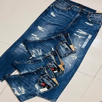Pantalon slim déchiré décontracté pour homme, style européen et américain, de haute qualité, nouveau, effet usé, lot de surplus mélangé