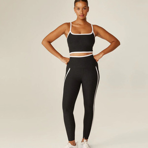Bande blanche de vente en gros ensemble de yoga de gymnastique de 2 pièces pour femmes ensemble de yoga sportif de taille haute avec logo personnalisé ensemble de yoga de levage des fesses pour adulte - Product Image 1
