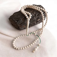 Tasbih Misbaha islamique en os de buffle véritable, écologique, 99 perles, avec motif floral, pour musulmans