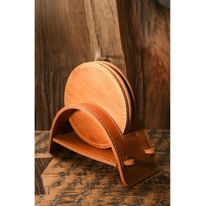 2026 Texas-Longhorn Cowhide <b>Coaster</b> With Leather Braided-Edge Cowhide <b>Coasters</b>-Natural Leather Assorted-Tones - Product Image 1