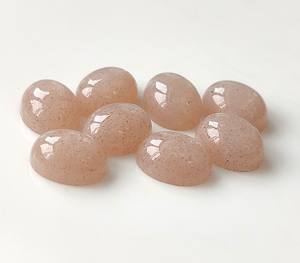 Prix de gros Pierre de lune pêche naturelle Cabochon ovale en vrac 3x5mm-20x30mm à dos plat Effet de couleur/feu pour la fabrication de bijoux - Product Image 1