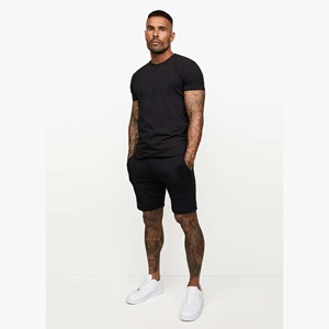 Conjunto de 2 piezas de estilo callejero de verano informal moderno para hombre, Camiseta de algodón suave con patrón sólido y pantalones cortos de punto transpirables - Product Image 2