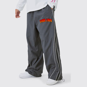 Pantalones de hombre al por mayor 100% nailon, personalizados, lavados, de pierna ancha, estilo casual, con franjas laterales y cintura elástica. - Product Image 1