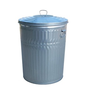 Sturdy <b>metal</b> waste <b>bin</b> with artistic craftsmanship and traditional design ideal for modern and vintage interior settings - Product Image 1