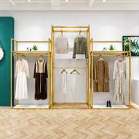 Présentoirs de vêtements sur pied en acier inoxydable doré sur mesure, équipements de magasin en gros pour chaînes de boutiques et commerces de détail