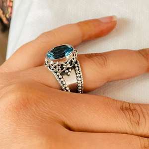 แหวนสัญลักษณ์บุษราคัมสีฟ้าของสวิสแบบพรีเมี่ยมสำหรับผู้หญิงเงินสเตอร์ลิงออกซิไดซ์ทรงรีตัดเป็นของขวัญแบบโบฮีเมียน - Product Image 3