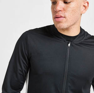 Conjunto Deportivo Unisex de 2 Piezas con Chaqueta Cortavientos de Nailon y Pantalones Deportivos de Poliéster con Cierre y Cuello Acanalado, Diseño Sólido y Transpirable - Product Image 6