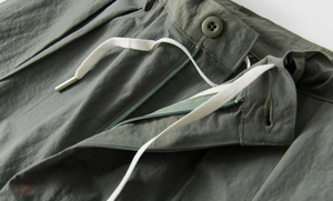 Short unisexe confortable à séchage rapide Pantalon court de haute qualité pour homme, respirant, style décontracté, motif solide, tissage non tissé - Product Image 6