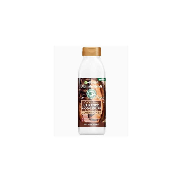 Cleanse and define your curls with Garnier Ultimate Blends Hair Food 350ml Shampoo Cocoa Butter formula