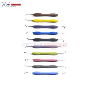 Juego de instrumentos quirúrgicos dentales de 10 piezas, relleno compuesto, Manual, clase I, mango de silicona, resina de acero, esterilización aprobada por CE - Product Image 1