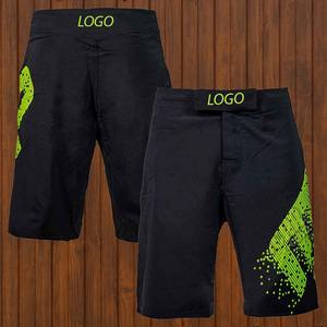 กางเกง MMA คุณภาพพรีเมียมสำหรับการต่อสู้ ลดราคาออนไลน์ จัดจำหน่ายโดยตรงจากโรงงาน พร้อมโลโก้ด้านหน้า ชุดกีฬาศิลปะการต่อสู้ - Product Image 2