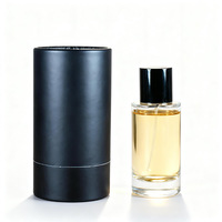 Vente en gros de flacons de parfum cylindriques en verre transparent 30ml/50ml/100ml avec vaporisateurs à fine brume pour recharges de parfum