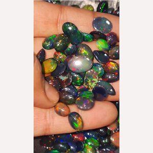 318 Piezas de Ópalo Negro Etíope Natural con Fuego, Cabujón Ovalado de 10mm a 15mm, 622 Quilates, Iroc Sales, Piedras Preciosas Sueltas, US$996 en total - Product Image 1