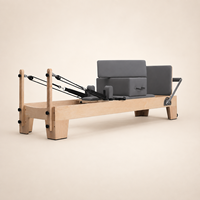 Reformer de Pilates professionnel avec cadre en érable nord-américain massif et ressorts allemands pour les équipements de fitness des hôtels