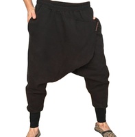 Vente en gros 2025, pantalon de survêtement pour homme, 100% polyester, coupe régulière, taille élastique, entrejambe tombant, respirant, pour l'hiver