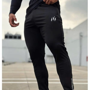 SP05, pantalones ligeros de algodón para correr, absorbe el sudor rápido con sensación suave para una movilidad cómoda y deportiva, disponible en negro y blanco - Product Image 1
