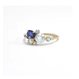 Natural Blue Sapphire Sky Blue Topaz in 14 Karat Gold Designer Band Wholesale Ring
