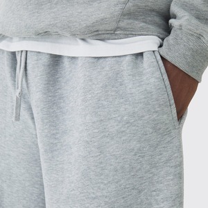 Pantalon de survêtement blanc évasé à jambes larges 4OOGSM de qualité supérieure en gros Pantalon Streetwear gris avec logo personnalisé de couleur unie pour hommes - Product Image 4