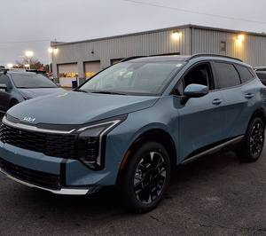 Kia Sportage hybride SX-Prestige AWD 2026 bleu éclatant, voiture d'occasion avec toit ouvrant, démarrage à distance, sièges en cuir, transmission automatique, jantes en alliage - Product Image 1