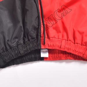 Pantalones de esquí impermeables rojos y negros de dos colores para exteriores Pantalones de snowboard con bucles para cinturón Bolsillos con cremallera y cintura con cordón - Product Image 3
