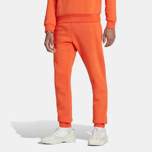 Pantalon de survêtement Slim Fit Heavyweight 70% coton 30% polyester recyclé polaire Semi Impact Orange Essentials Trefoil - Product Image 1