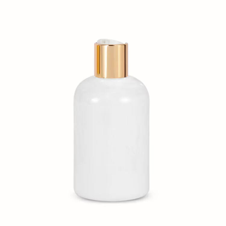 bottle with disc top cap