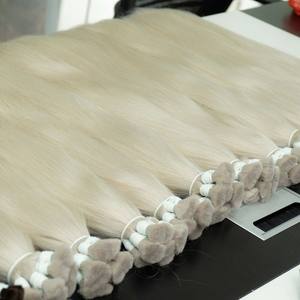 Precio al por mayor Extensiones de cabello a granel de alta calidad 100 gramos 22 pulgadas Textura natural de color claro dibujado Doble - Product Image 3