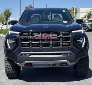 รถกระบะ GM-C Can-yon AT4X รุ่นปี 2026 แบบ Crew Cab ขับเคลื่อน 4 ล้อ สีดำ พร้อมไฟหน้า LED และยาง R20 เกียร์อัตโนมัติ - Product Image 1