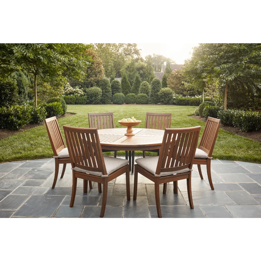 Lily round dining table set in solid teak wood with 6 chairs and waterproof cushion with walnut finish.