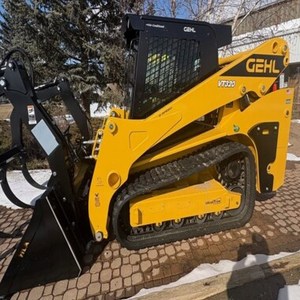 รถตักล้อยางขนาดเล็ก GEHL VT320 CAB แบบตีนตะขาบ - Product Image 1