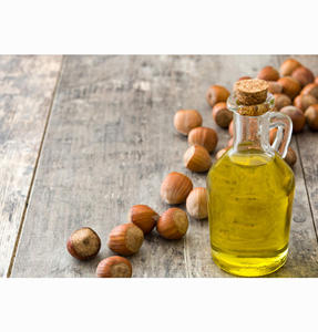 Huile de noisette pure naturelle en vrac pour les soins capillaires, vente en gros - Product Image 1