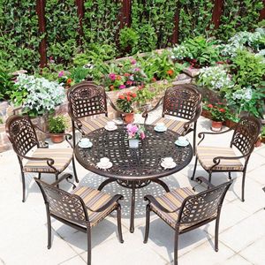 Ensemble de table en fonte d'extérieur avec huit chaises élégantes, résistant aux intempéries, design traditionnel pour hôtel, cour et ferme - Product Image 1