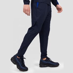 Personalizado cortavientos escuela poliéster pantalones apilados cremallera de dos piezas chándal chaquetas cortavientos conjunto hombres - Product Image 5